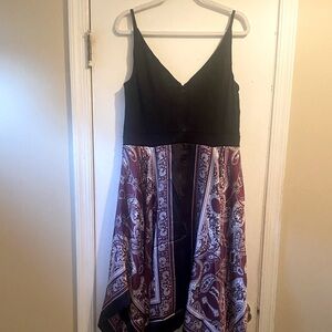 Light fabric perfect for warm weather. Spaghetti strap with beautiful movement